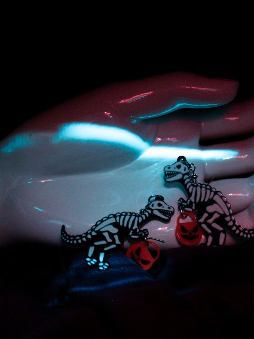 Skeleton Dinosaur Pet Toy Charm in Black and White with Orange Accent Earrings